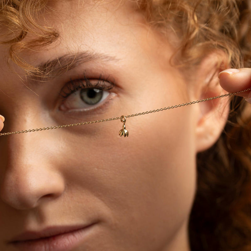 Edle Goldkette mit individuellem Anhaenger aus 18kt Gold – handgefertigt in Tirol. Zeitlos, hochwertig, einzigartig.