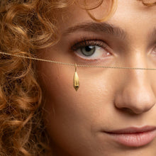 Persoenlich und bedeutungsvoll: 18kt Goldkette mit Anhaenger fuer individuelle Gravur – ein Geschenk mit Tiefe.