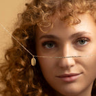 Persoenlich und bedeutungsvoll: 18kt Goldkette mit Medaillon Anhaenger fuer individuelle Gravur – ein Geschenk mit Tiefe.